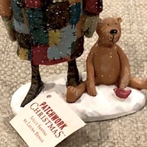 ISO I am Looking to buy this Figurine Jolly Santa by Laura Bence